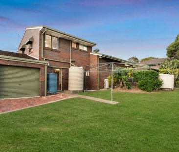 “Split Level 4 bedroom home with plenty of space for the family!” - Photo 1