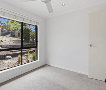 Charming Family Home with Pool & Spacious Living in Oxenford - Photo 6