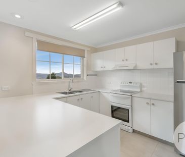 Convenient Location & Spacious Home - Photo 1