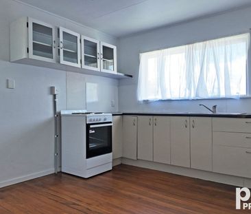 High-Set Home with Large Backyard - Photo 1