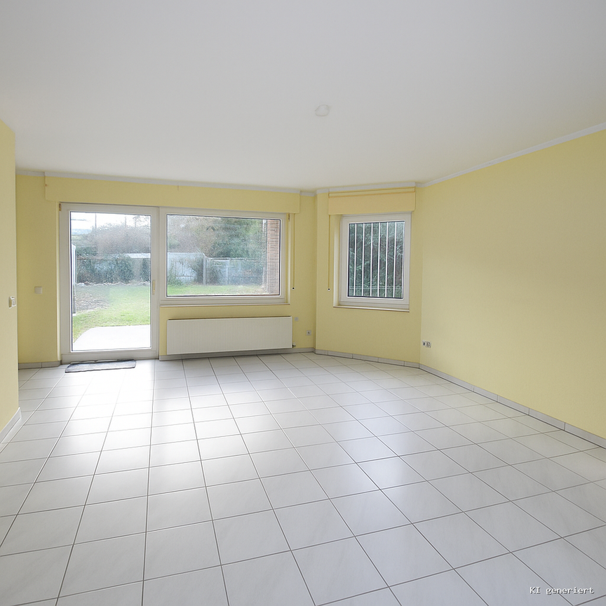 Zentral gelegene 3-Zimmer-Maisonette-Wohnung mit großem Garten und Garage! - Photo 1