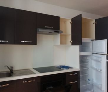 Location Appartement 1 pièce 35m² NIMES 30000 - Photo 2