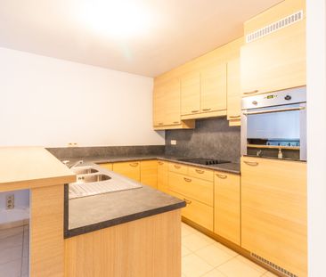 Ruim 2-slaapkamerappartement met terras en garagebox! - Photo 4