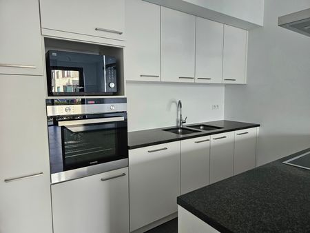 Gelijkvloers appartement met 1 slaapkamer, terras en parking - Photo 4