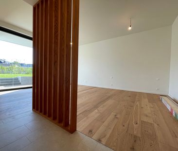 Prachtig gelijkvloers BEN-appartement met tuin en terras - Photo 1