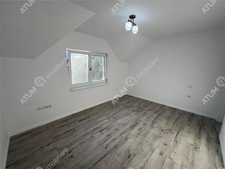 De inchiriat casa individuala cu 4 camere 3 bai amplasata pe teren de 250 mp situata in Cisnadie Sibiu - Photo 2