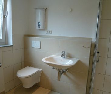 Modern u. gemütlich: 2‑Zimmer‑Erdgeschoss-Wohnung mit Balkon, Dusch... - Foto 5