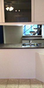 Logement grand 3 1/2 avec 2 salle eau sur 2 étage près du parc victoria et lac Boivin - Photo 3