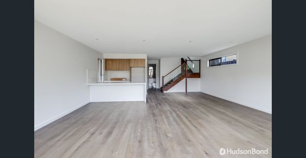 Lux living spread across three stories - Photo 1