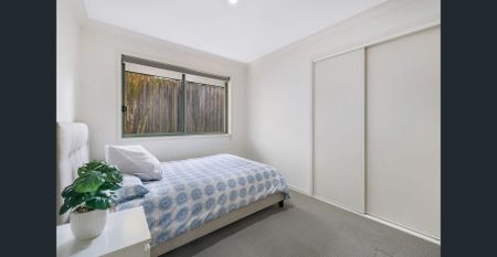 Perfect Family Lifestyle - Modern 4-Bedroom in Sought-After Upper Coomera - Photo 3