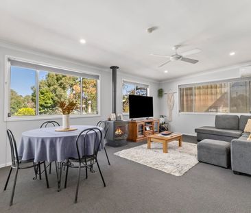 Charming Family Home with Space, Comfort & Convenience - Photo 1