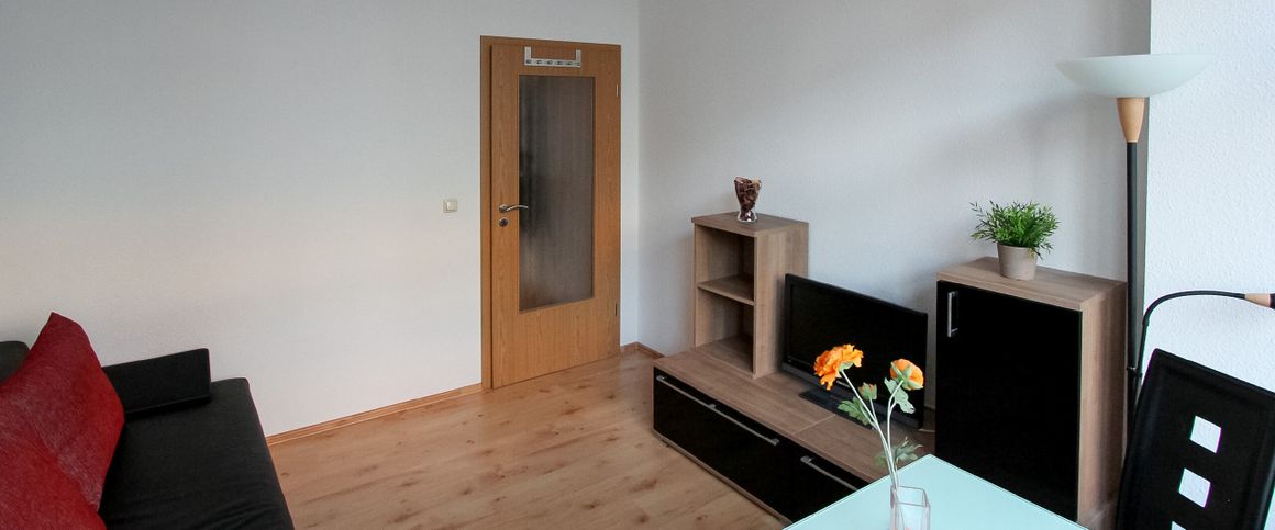 Ihre flexible und möblierte Wohnlösung mit Balkon in perfekter Lage! - Foto 1