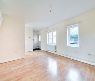 A 2 bedroom mid-terraced house. - Photo 1