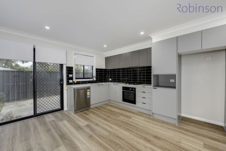 Brand new three bedroom townhouse with ducted air conditioning - Photo 4