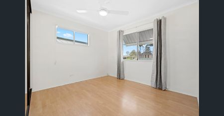 High set, relaxed Living in a Central Location! - Photo 3