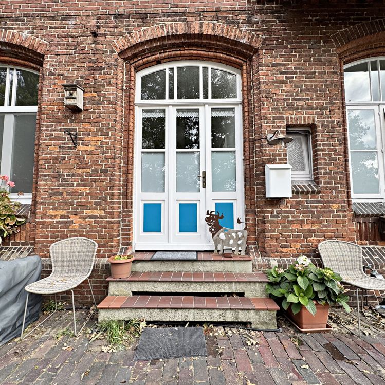 Detern - Leben im historischen Bahnhof! Geräumige Wohnung auf zwei Etagen. - Photo 1