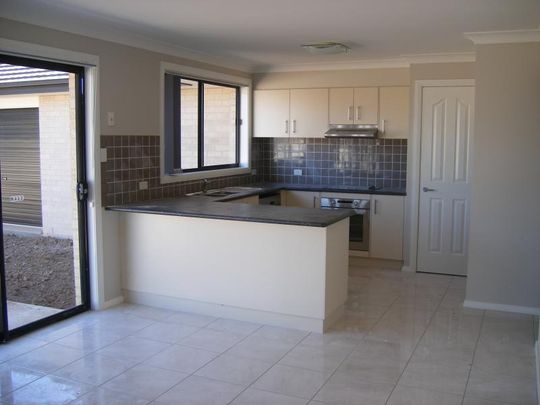 OXLEY VALE - Four Bedroom Double Garage - Photo 1