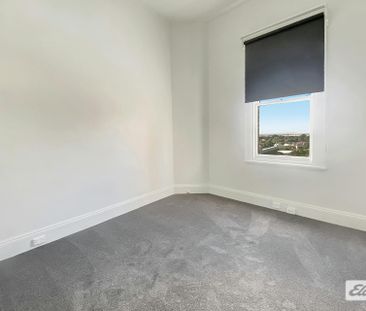 Centrally Located & Low Maintenance Unit - Photo 3