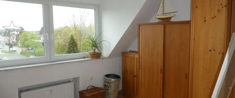 Hübsche 2-Zimmer-Dachgeschoss-Wohnung im Herzen von Asberg - Photo 1
