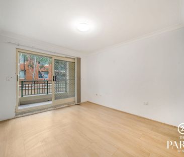 Spacious Apartment with Leafy Outlooks & Resort-Style Pool - Photo 1