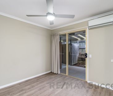 Low-Maintenance Living with Private Courtyard in Glenvale - Photo 2