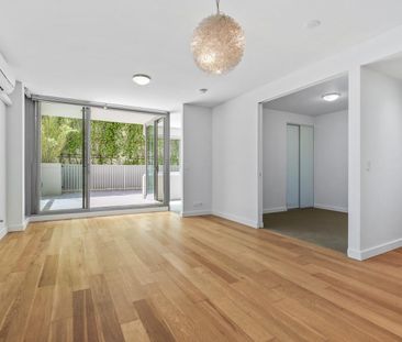 Modern & Stylish 1-Bedroom Apartment with Study & Parking - Photo 1