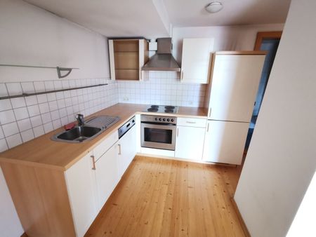 Besondere 2-Zimmer-Dachgeschoss-Wohnung in wunderschönem Altbau - Foto 4