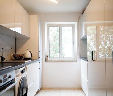 Stilvolle 2-Zimmer-Wohnung mit neuer Küche & modernem Bad in Tuttli... - Foto 1