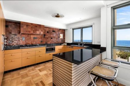 Furnished Coastal Oasis with Panoramic Views and Artistic Flair - Photo 5