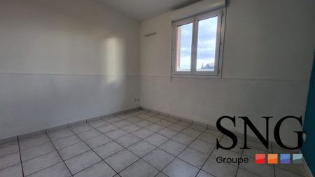 T2 AVEC 1 GARAGE+ 1 PKG ET JARDINET - Photo 2