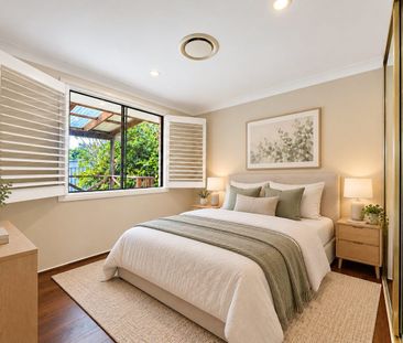 Spacious Four-Bedroom Family Home with Multiple Living Areas - Photo 6