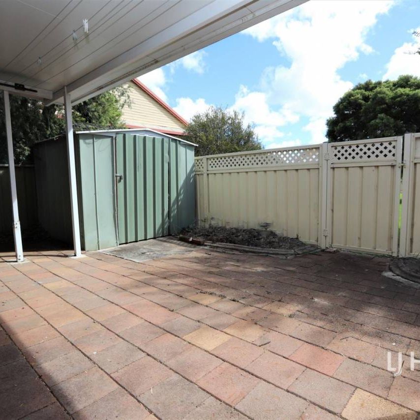 Quality Unit in Convenient Setting - Photo 1