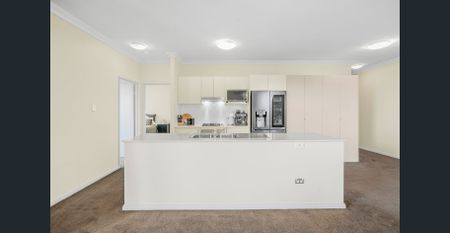 Experience Luxury and Convenience in a Prime Norwest Apartment! - Photo 3