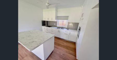 FULLY RENOVATED DUPLEX WITH MOWING INCLUDED - Photo 3