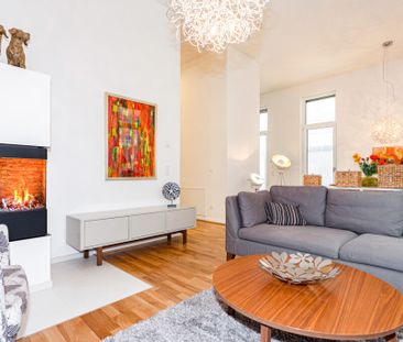 Attraktive 3-Zimmer-Erdgeschosswohnung mit Terrasse und Kamin! - Photo 1