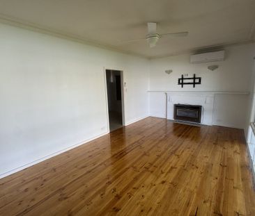 Conveniently Located 3-Bedroom Home - Photo 1