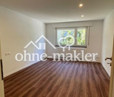 Design trifft Komfort: Hochwertige EG-Wohnung mit Terasse, Stellpla... - Foto 2