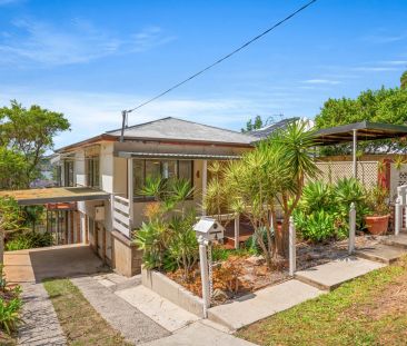 Conveniently Located Cottage with Captivating Water Views - Photo 1