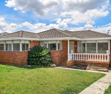 Tidy Three Bedroom Home in a Great Location! - Photo 1