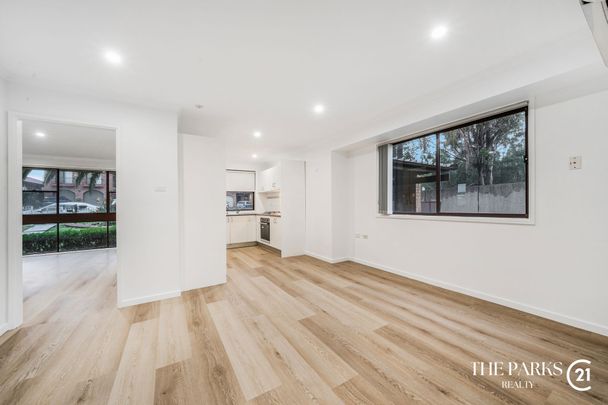 Newly Renovated Family Home in Sought after Bossley Park - Photo 1