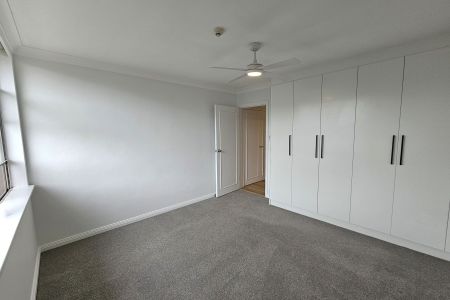 IMPECCABLY RENOVATED APARTMENT OFFERING COMFORT, STYLE AND CONVENIENCE - Photo 4