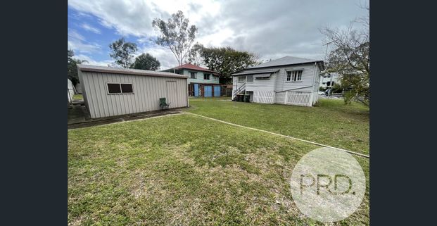 Charming Family Home with Space, Storage & Convenience - Photo 1