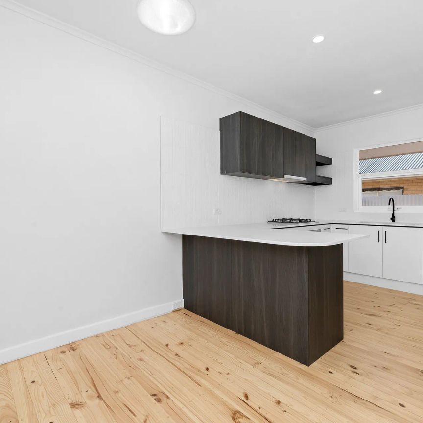Modern, Fully Renovated Unit in a Convenient Location - Photo 1
