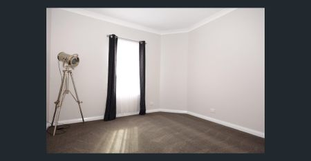 Tastefully Renovated & Ideally Located - Photo 4