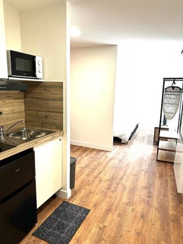 A LOUER TRES BEL APPARTEMENT MEUBLE EN PLEIN CENTRE VILLE DE ST QUENTIN 02100 - Photo 5