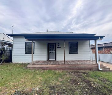 Freshly Renovated Family Home - Photo 1