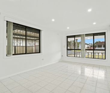 Modern Four Bedroom In a Convenient Location! - Photo 6