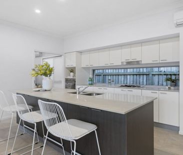 Elegant Family Living with Dual Zones & Private Alfresco in Wakerley - Photo 6