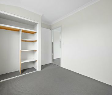 Spacious Family Living in a Quiet Coastal Pocket - Photo 4