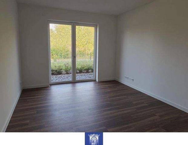 Ihr neuer Wohntraum im attraktiven Neubau, große Terrasse, ruhige Lage mit viel Grün! - Photo 1